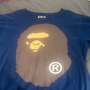 Blue Graphic Tee with Brown and Yellow Ape Design